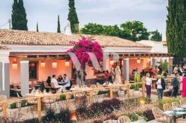 Outdoor Restaurant with Wooden Deck and Surrounding Tropical Setting, Almancil
