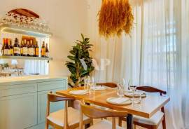 Outdoor Restaurant with Wooden Deck and Surrounding Tropical Setting, Almancil