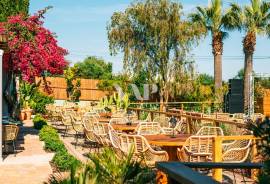 Outdoor Restaurant with Wooden Deck and Surrounding Tropical Setting, Almancil