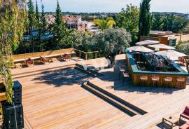Outdoor Restaurant with Wooden Deck and Surrounding Tropical Setting, Almancil