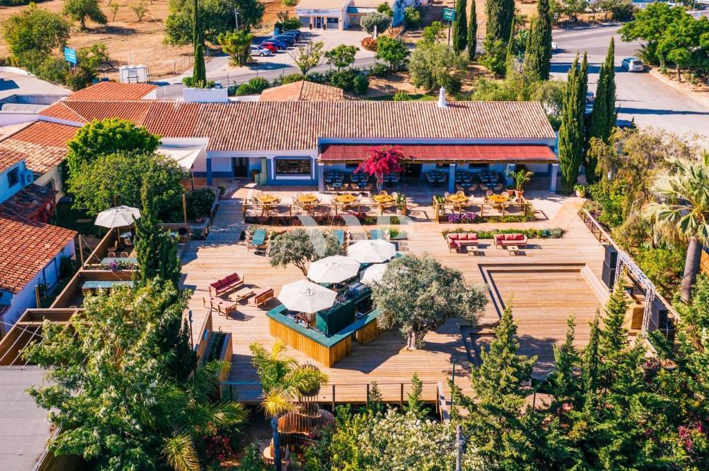Outdoor Restaurant with Wooden Deck and Surrounding Tropical Setting, Almancil