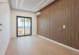 Renovated 2+1 Bedroom Apartment on the First Line of Quarteira Beach – Stunning Sea View