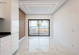 Renovated 2+1 Bedroom Apartment on the First Line of Quarteira Beach – Stunning Sea View