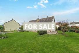 Detached Coastal House with Landscaped Garden