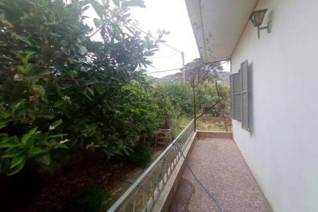2 bedroom detached house with large garden in traditional village.