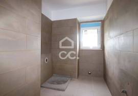 House converted into two two-bedroom apartments with separate entrances and patio!