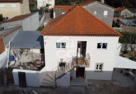 House converted into two two-bedroom apartments with separate entrances and patio!