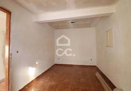 House converted into two two-bedroom apartments with separate entrances and patio!