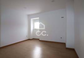 House converted into two two-bedroom apartments with separate entrances and patio!