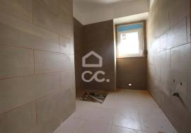 House converted into two two-bedroom apartments with separate entrances and patio!