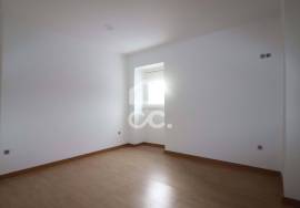 House converted into two two-bedroom apartments with separate entrances and patio!