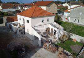 House converted into two two-bedroom apartments with separate entrances and patio!