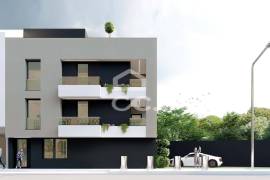 Land with approved project for a building with 3 apartments in the center of Avelar.