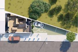 Land with approved project for a building with 3 apartments in the center of Avelar.