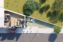 Land with approved project for a building with 3 apartments in the center of Avelar.