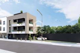 Land with approved project for a building with 3 apartments in the center of Avelar.