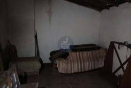 House to recover with backyard in the city center.