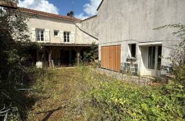Renovation Opportunity: Traditional Village Home with Outbuildings - €55,000