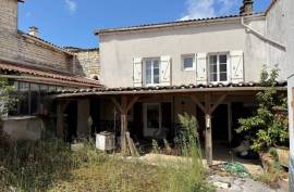 Renovation Opportunity: Traditional Village Home with Outbuildings - €55,000