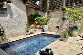 A Character Village House, Renovated Former Bakery, With 4 Bedrooms, Spacious Garage, Sunny Veranda And Courtyard With Plunge Pool.