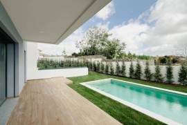 Moradia T4 em Manique com piscina e jardim privativos em condomínio fechado Moradia T4 em Manique com piscina e jardim privativos em condomínio fechado