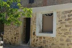 Traditional stone house with beautiful original features for sale in Zou.