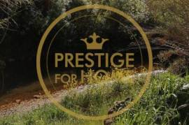 Located near the Roman bridge of Tôr, rustic land 1366 m2, contain a vegetable garden with 3 orange trees and 3 walnut trees, w / hole