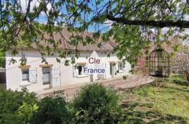 Superb Longere Style Property with Mature Garden