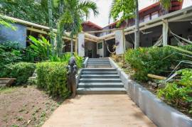 Tamarindo Boutique Hotel 175m from the Beach: Bohemian Oasis & Turnkey Income Opportunity in Costa Rica