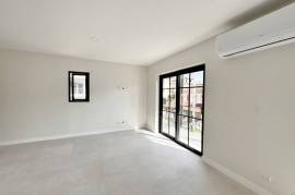 292052 La Rambla: Elegant Two-Bedroom Residence at the Crossroads of Las Catalinas' Energy and Charm