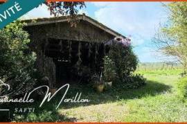 Terrain constructible avec grange 100m²