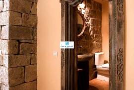 Rustic farmhouse Sant Pau of high standing with 16 hectares of land and apartments with rural tourism activity permit.