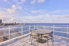 Sophisticated Seafront Penthouse with Designer Interiors