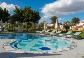 Two-Bedroom Apartment with Private Terrace and Garden in a Prestigious Algarve Residence Two-Bedroom Apartment with Private Terrace and Garden in a Prestigious Algarve Residence