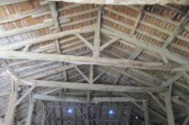 Cottage with very large barn in rural area with far reaching views. Smallholding potential.