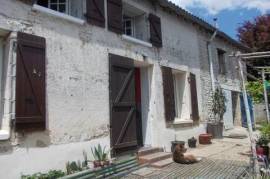 Village house with garage