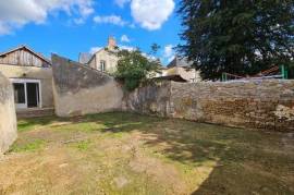 Immeuble comprenant deux appartement T3 et un studio
