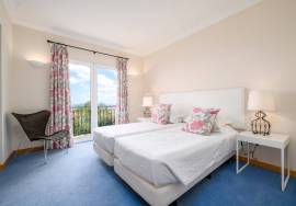 Elegant Duplex Apartment with Stunning Sea Views in Palheiro Village, Funchal