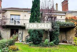Lovely Town House with Outbuilding in Landscaped Garden