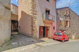 Charmante maison de village avec garage et extérieurs