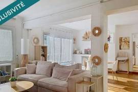 Appartement en centre ville de 100 m² avec trois chambres et balcon