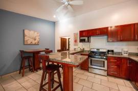 Guest House Apartments: Prime Investment Opportunity Updated Apartments in Flamingo Beach Area!