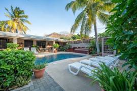 Guest House Apartments: Prime Investment Opportunity Updated Apartments in Flamingo Beach Area!