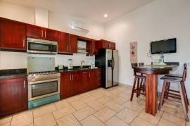 Guest House Apartments: Prime Investment Opportunity Updated Apartments in Flamingo Beach Area!