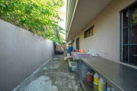 Guest House Apartments: Prime Investment Opportunity Updated Apartments in Flamingo Beach Area!