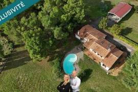 Maison avec grand terrain au calme