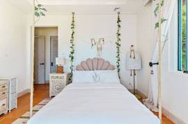 Villa Santorini: Four-level Oceanview Estate Nestled in the Hillside of Las Catalinas—Costa Rica's Premier Car-free Beach Town.