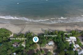 Prime Beachfront Property in Tamarindo: Rare Titled Land with Unlimited Development Potential!