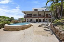 Casa Veranera & Bonus Lot: Elegant 7-Bedroom Coastal Estate with Ocean Views Steps from Playa Flamingo