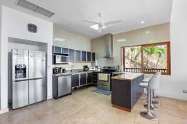 Casa Veranera & Bonus Lot: Elegant 7-Bedroom Coastal Estate with Ocean Views Steps from Playa Flamingo